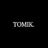 TOMIK.